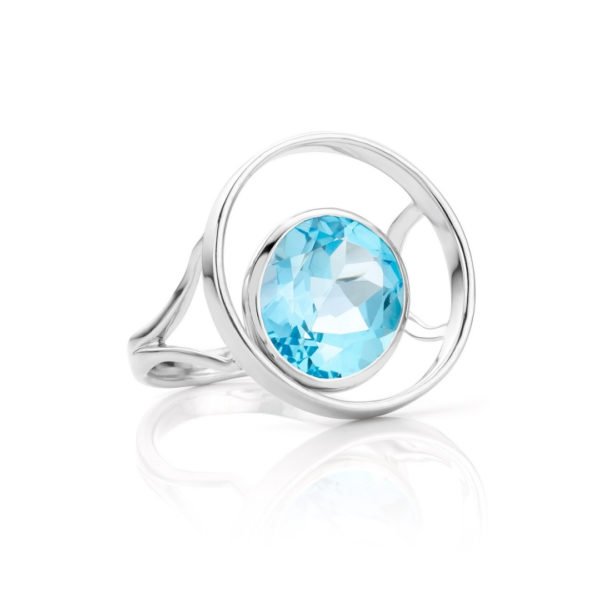 Audrey Huet Joaillerie : Bague ONE or blanc 18 carats topaze blue swiss symbole d'audace et d'élégance MADE in Belgium pour des femmes de caractère